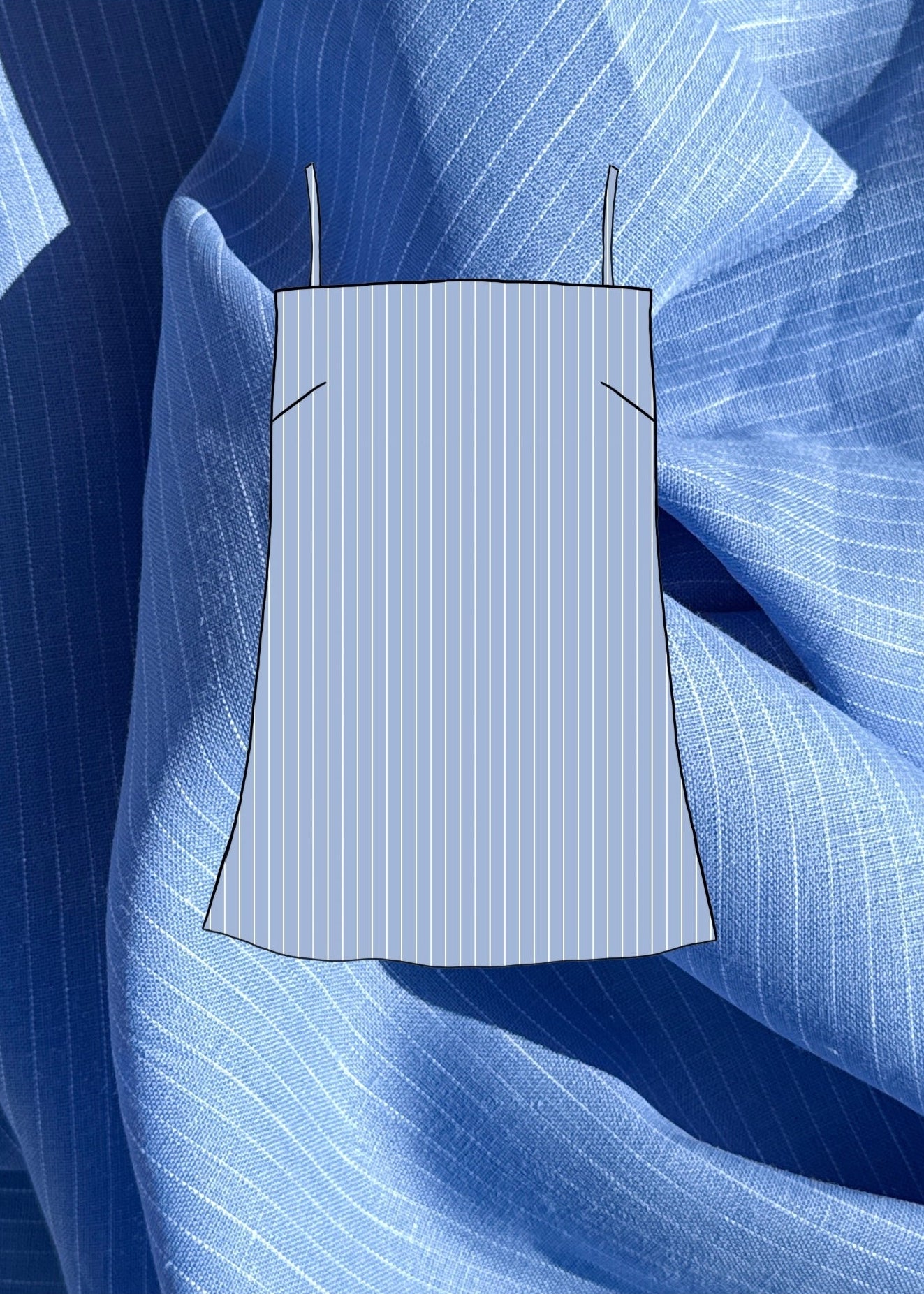 Blue top sketch on a textured blue linen fabric background