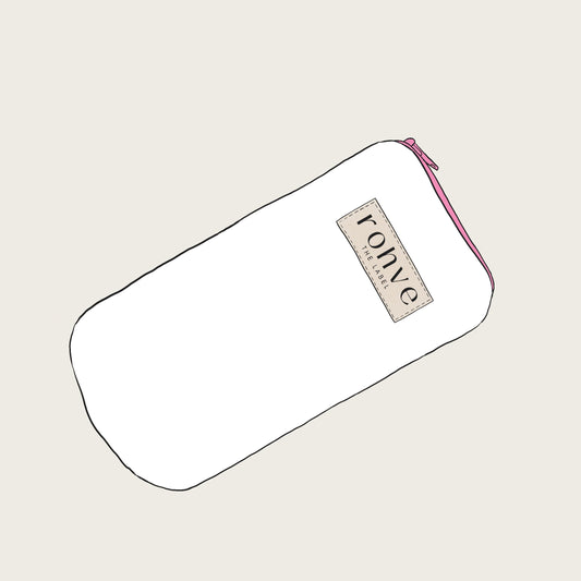 White pouch with a brand label on a light beige background sketch